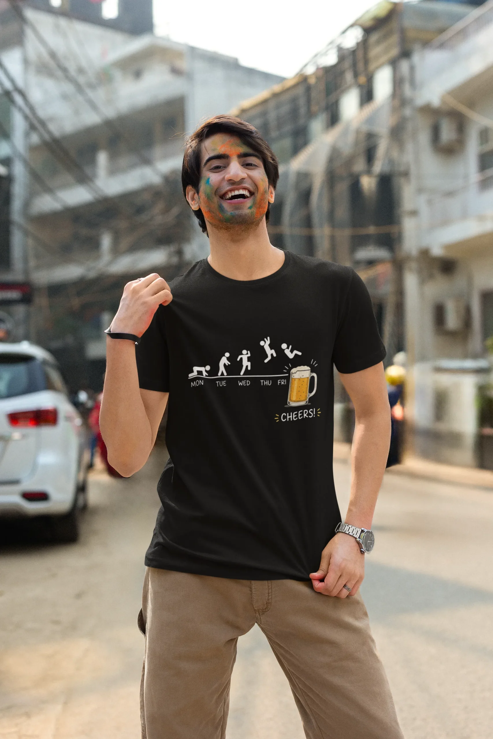 holi-festival-themed-mockup-featuring-a-man-wearing-a-scott-international-t-shirt-m37233 Friday Deserves a Cheer! Regular T-Shirt | Round neck - Image 1