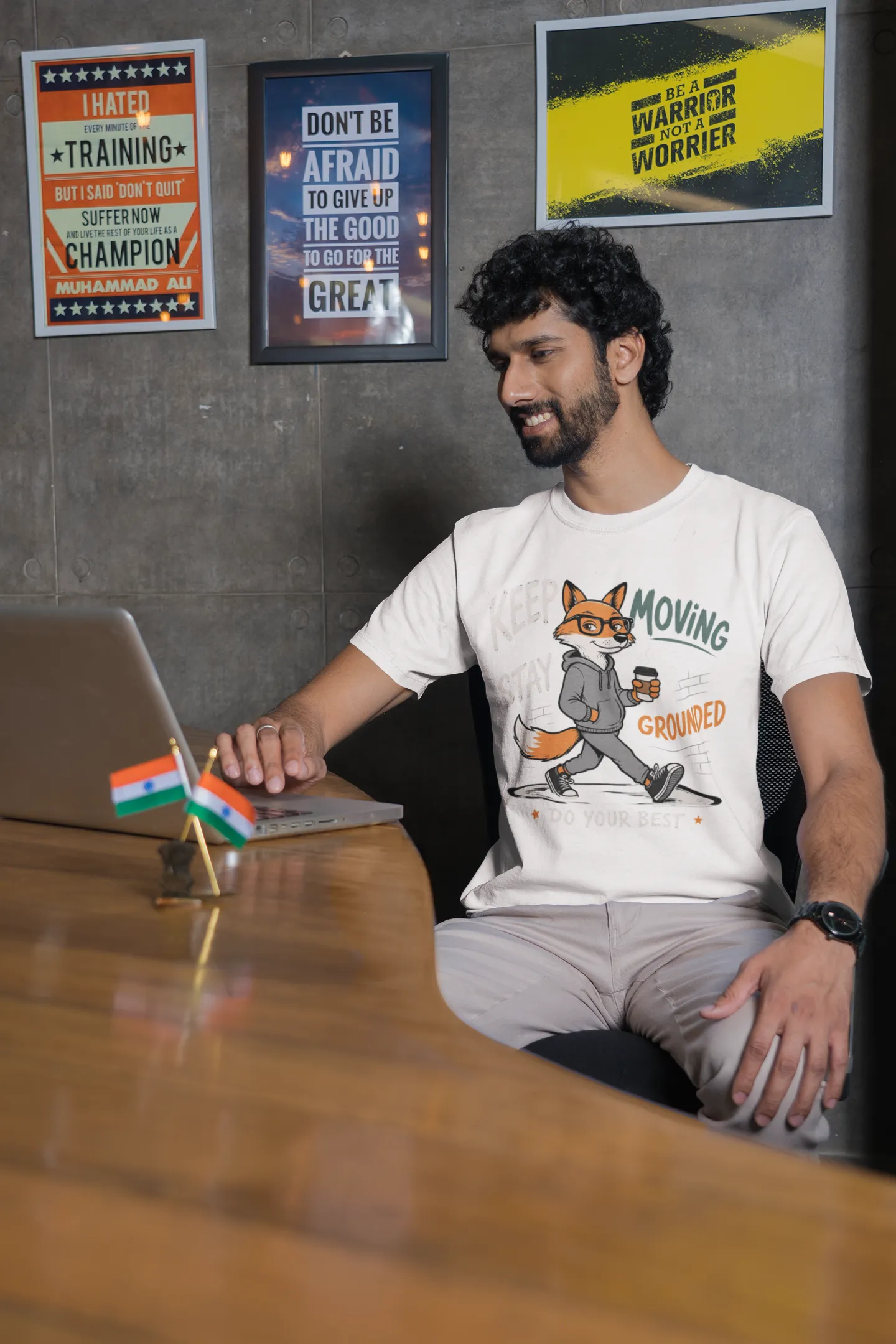 round-neck-gildan-tee-mockup-of-a-bearded-man-using-his-laptop-m31762 (1) Keep Moving Stay Grounded Regular T-Shirt | Round neck - Image 1