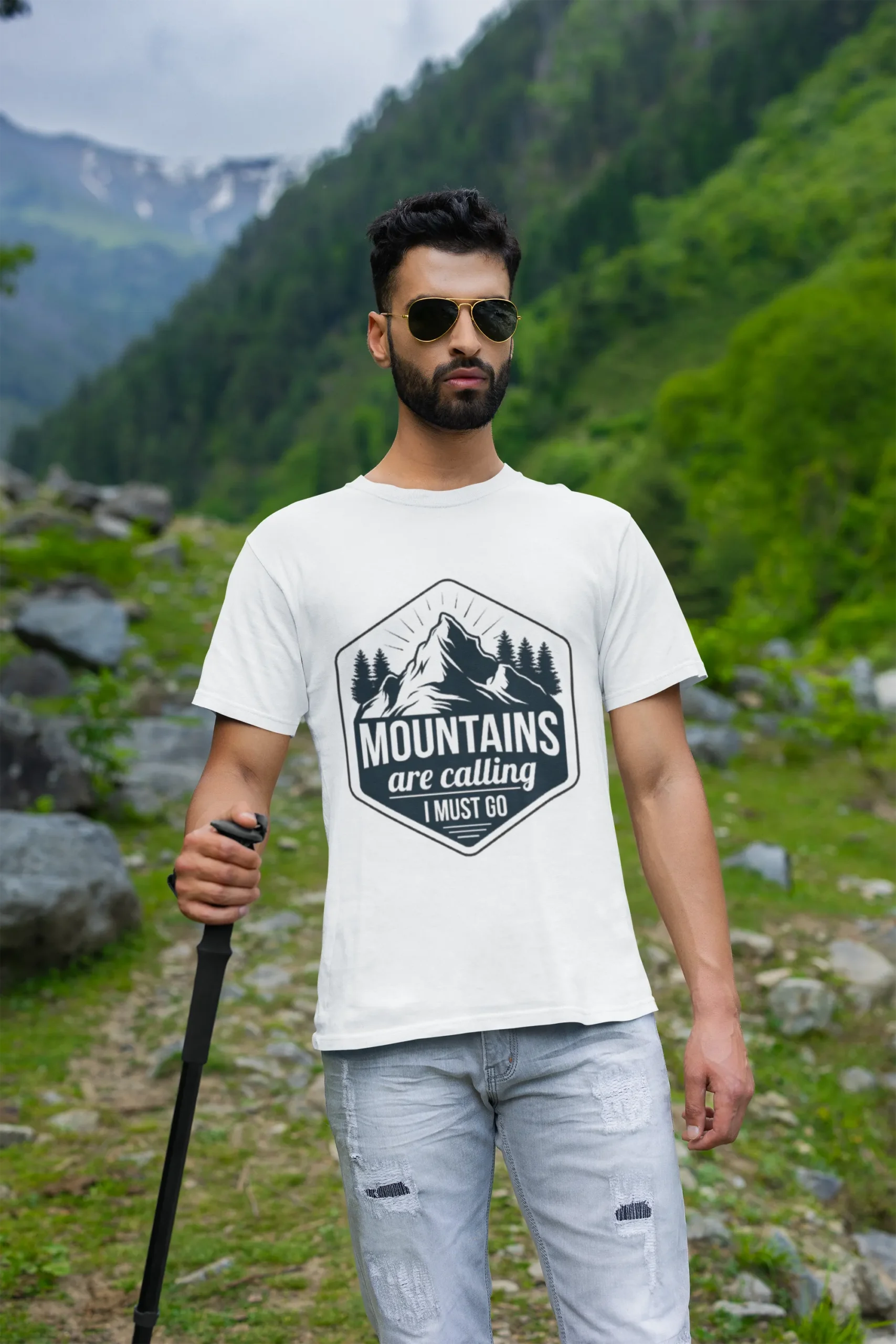 round-neck-tee-mockup-of-a-bearded-man-hiking-on-a-mountain-m35567 Mountains Are Calling Graphic Regular T-Shirt | Round Neck - Image 1